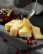 sliced fruit on stainless steel spoon