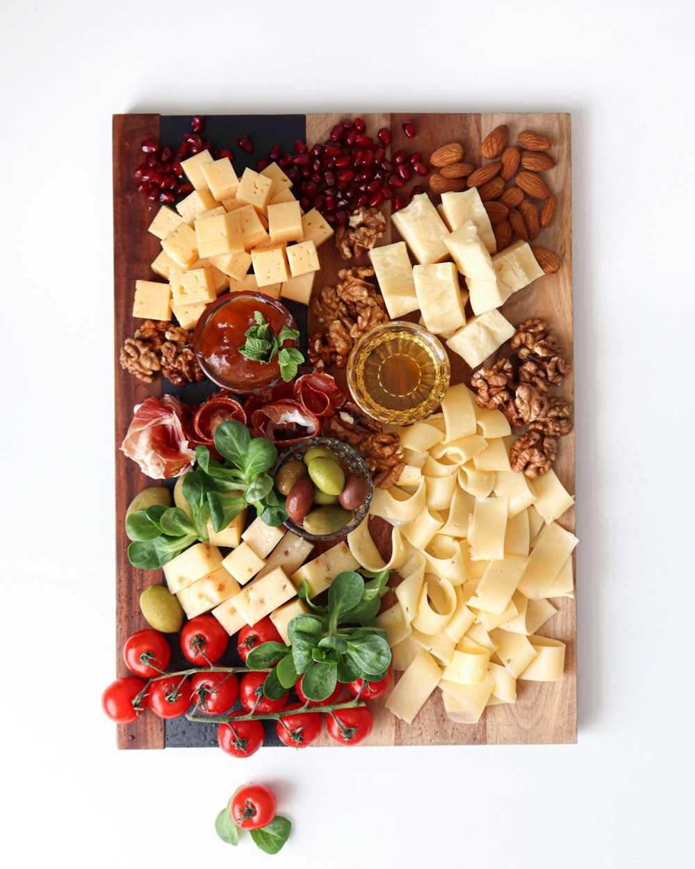 sliced vegetables on brown wooden chopping board