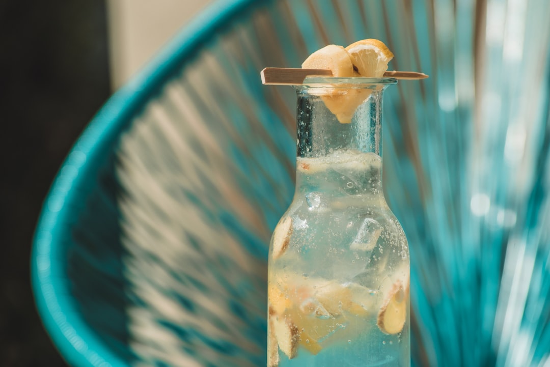 clear glass bottle with sliced lemon