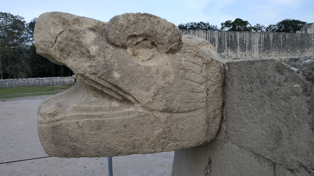 brown concrete statue during daytime