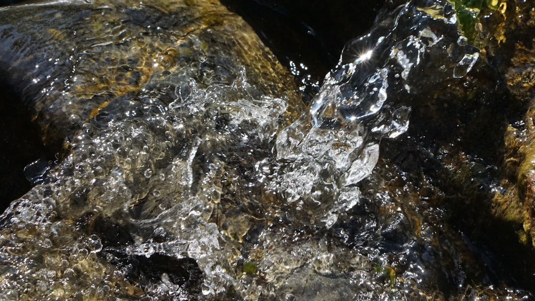 water splash on body of water