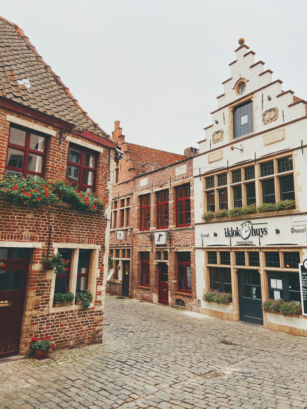 brown brick building with glass windows