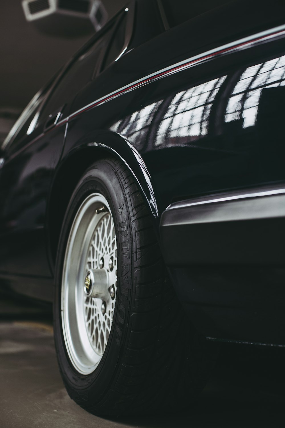 black car with chrome wheel