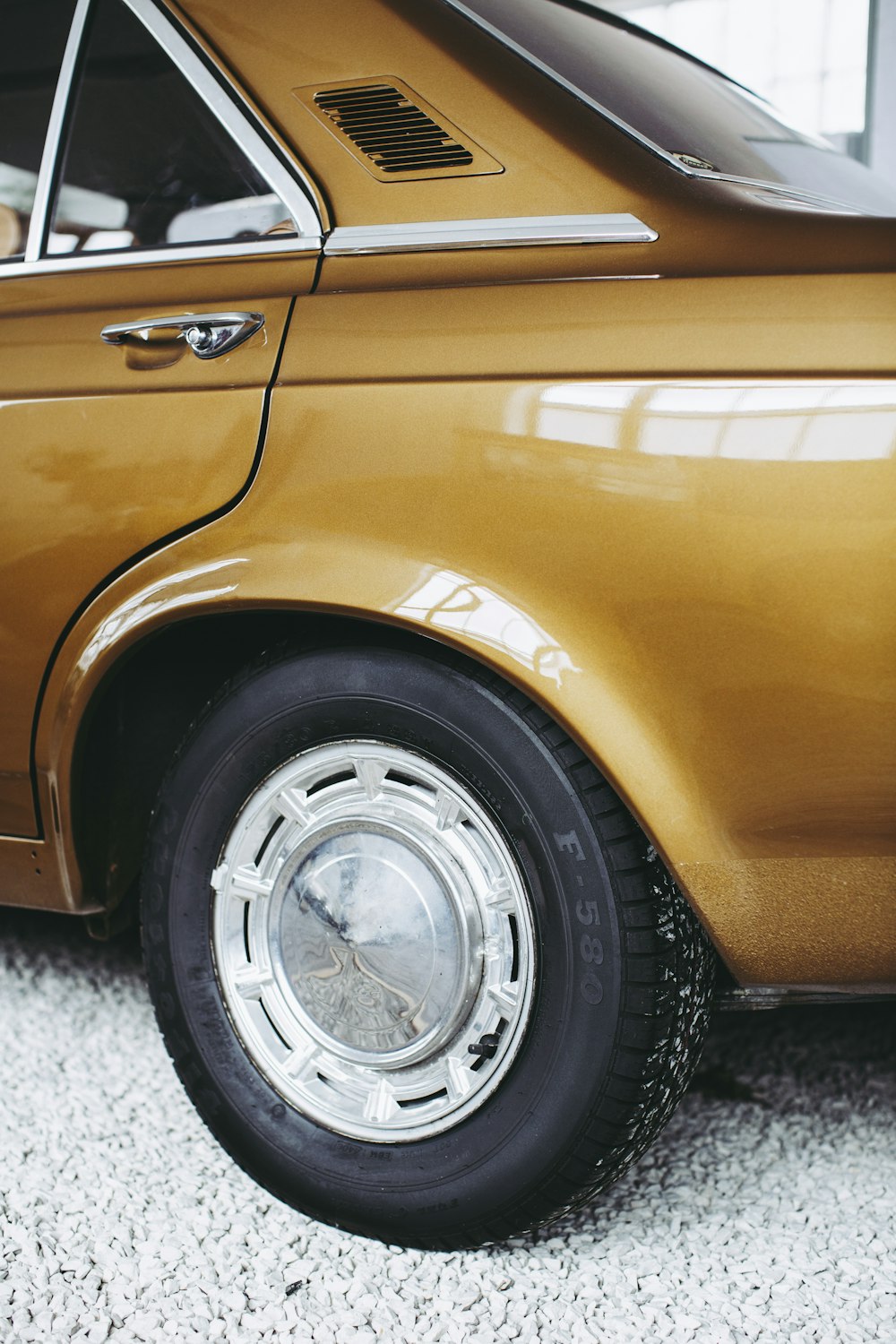 brown car with chrome wheel