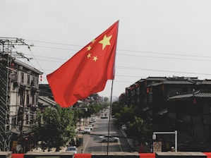 red and white flag on pole