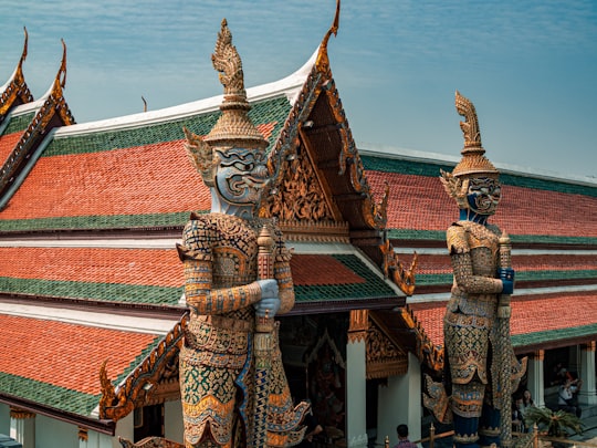 brown and white concrete building in Wat Phra Kaew Thailand