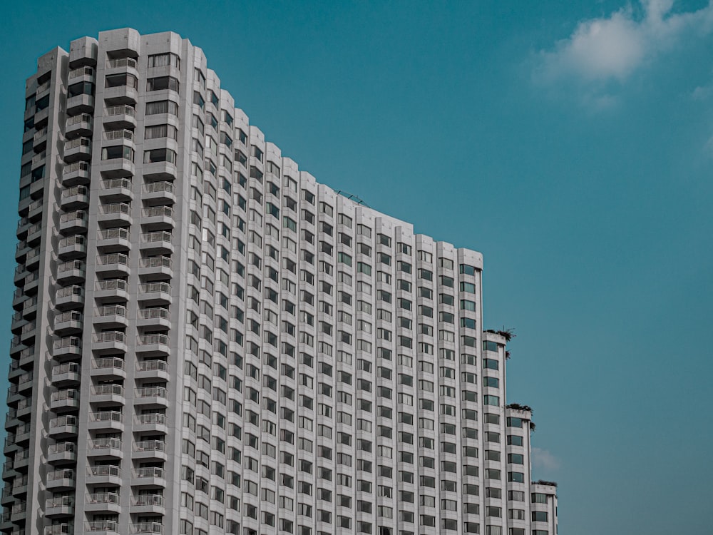 white concrete building under blue sky during daytime