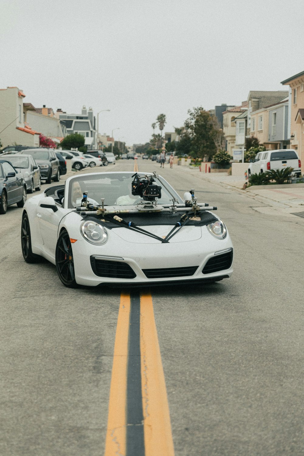 white porsche 911 on road during daytime