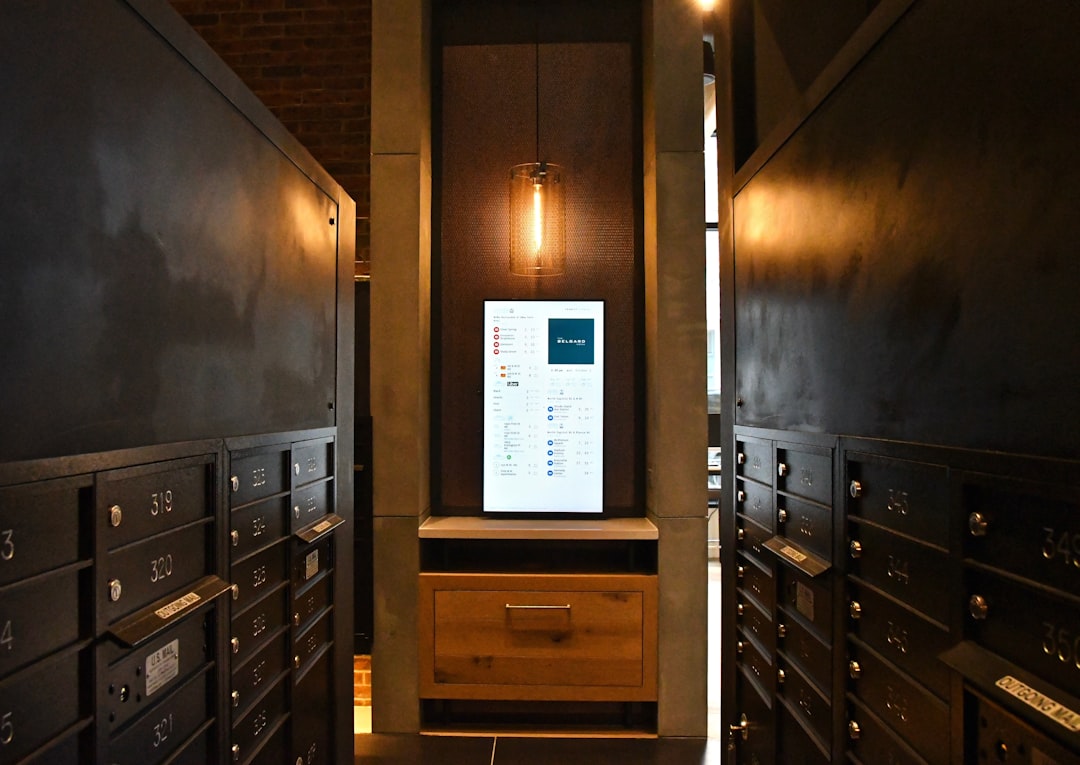 brown wooden cabinet with white printer paper,