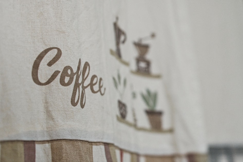 white and brown floral textile