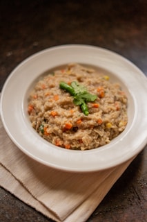 white ceramic round plate with food
