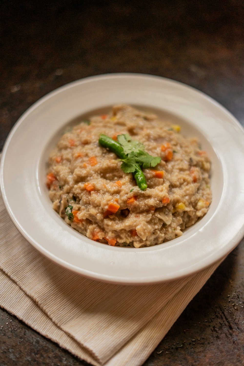 white ceramic round plate with food