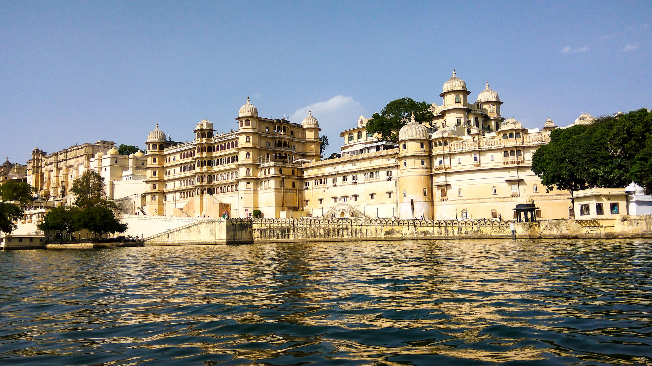 The City Palace of Udaipur stretched along the shore of Lake Pichola