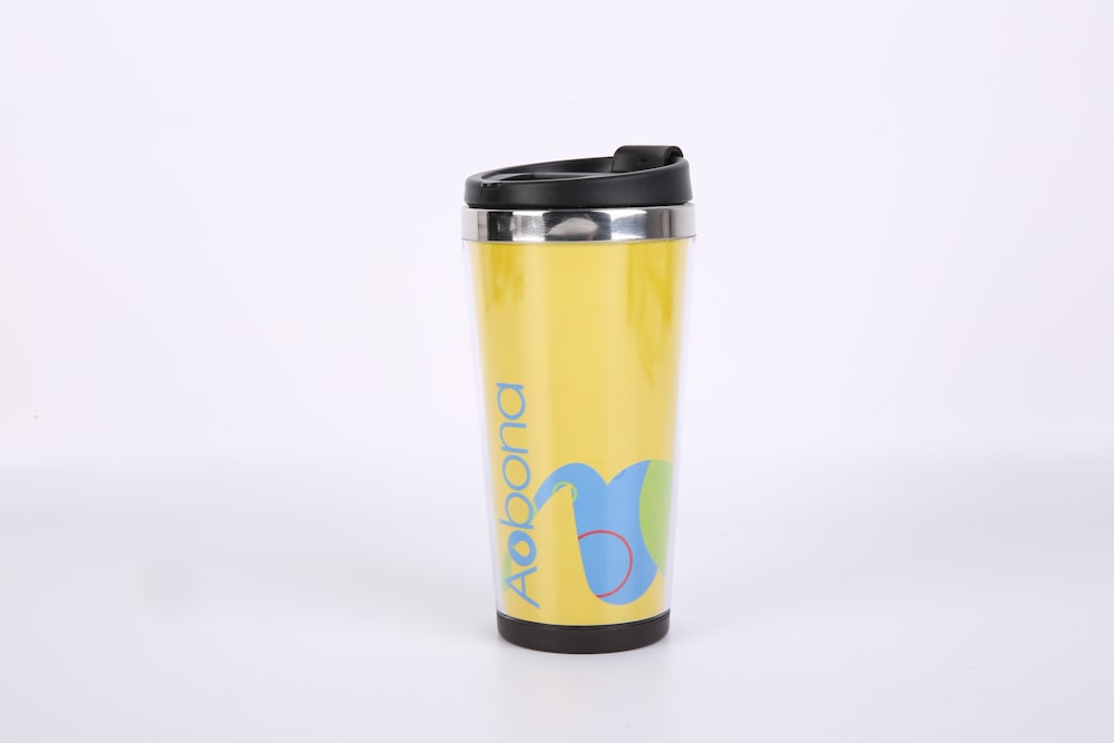 orange and black travel mug