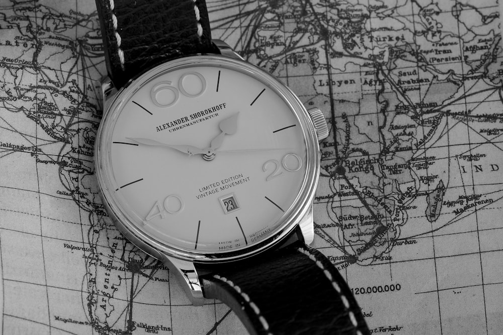 silver and white analog watch