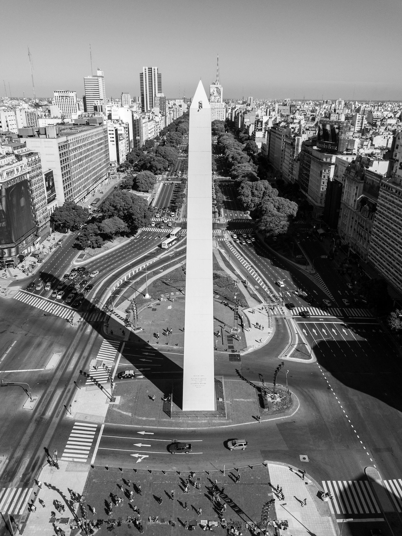 Buenos Aires with cars on road near city buildings where you can find luggage storage