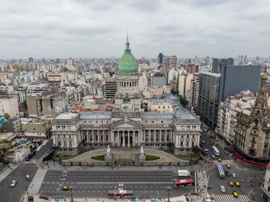 cars on road near city buildings during daytime in Palacio Barolo Argentina