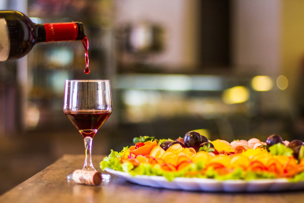 clear wine glass with red wine