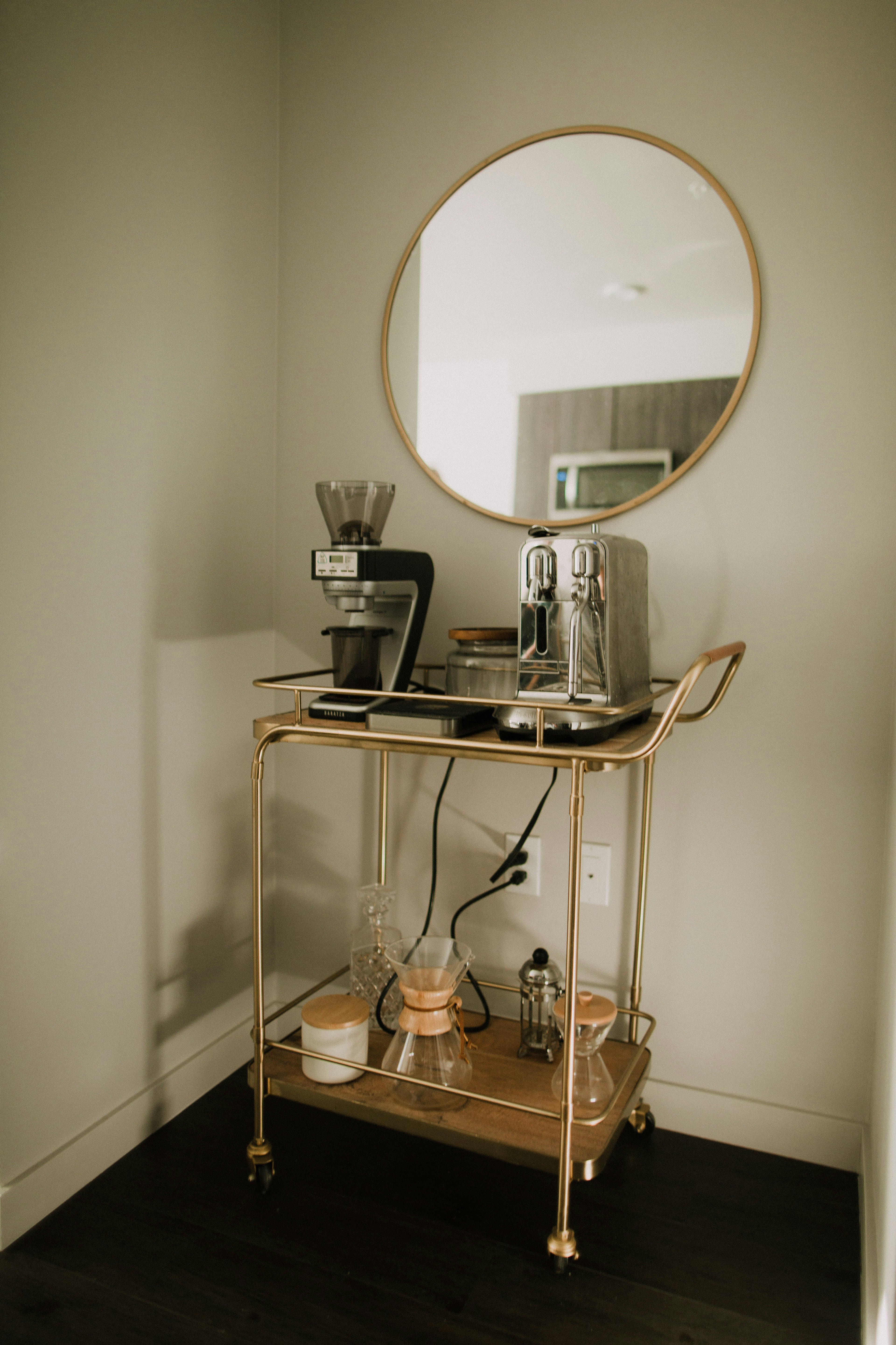 black and silver coffee maker on brown wooden table photo Free