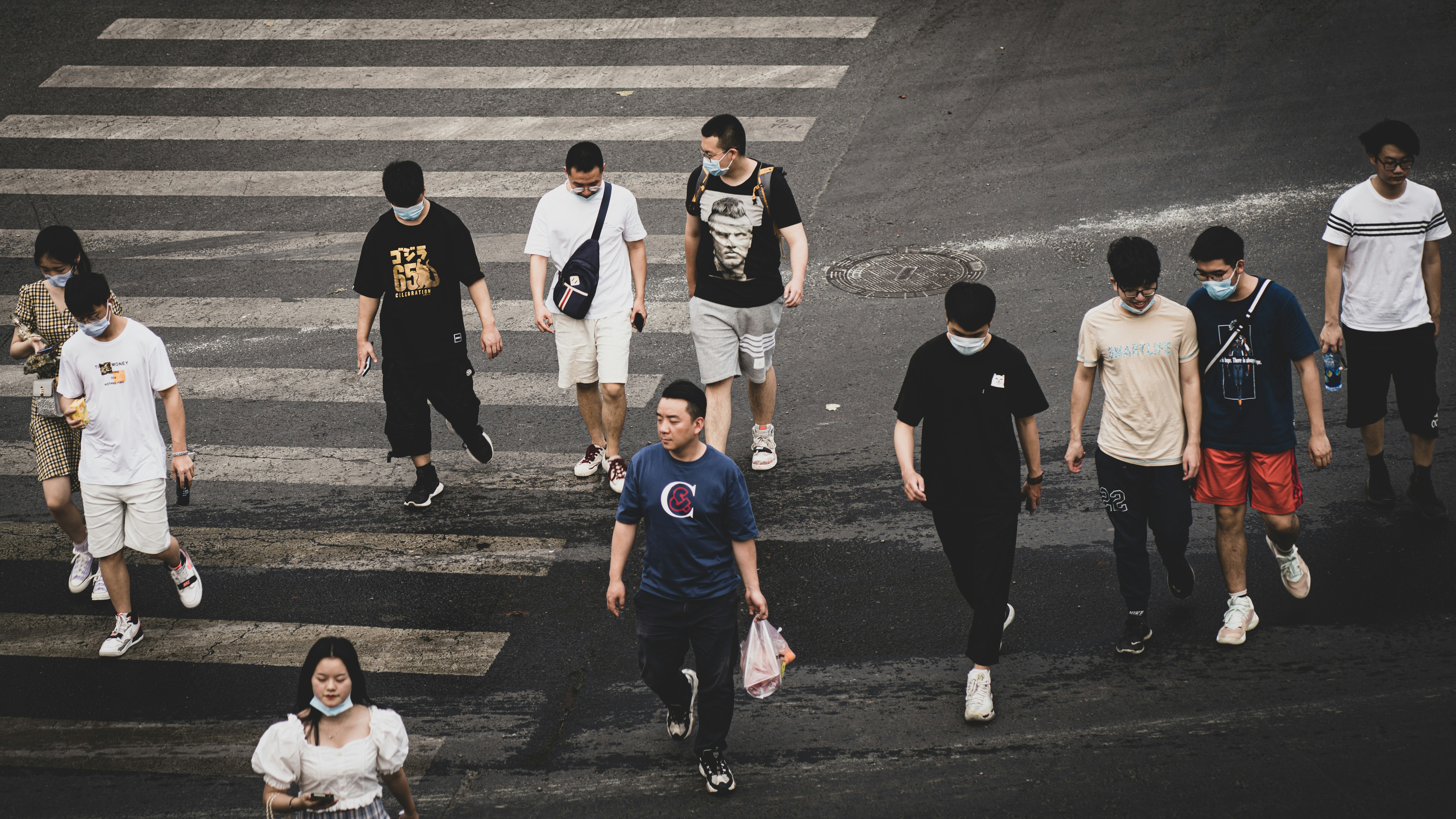 group of men in white and black crew neck t-shirts