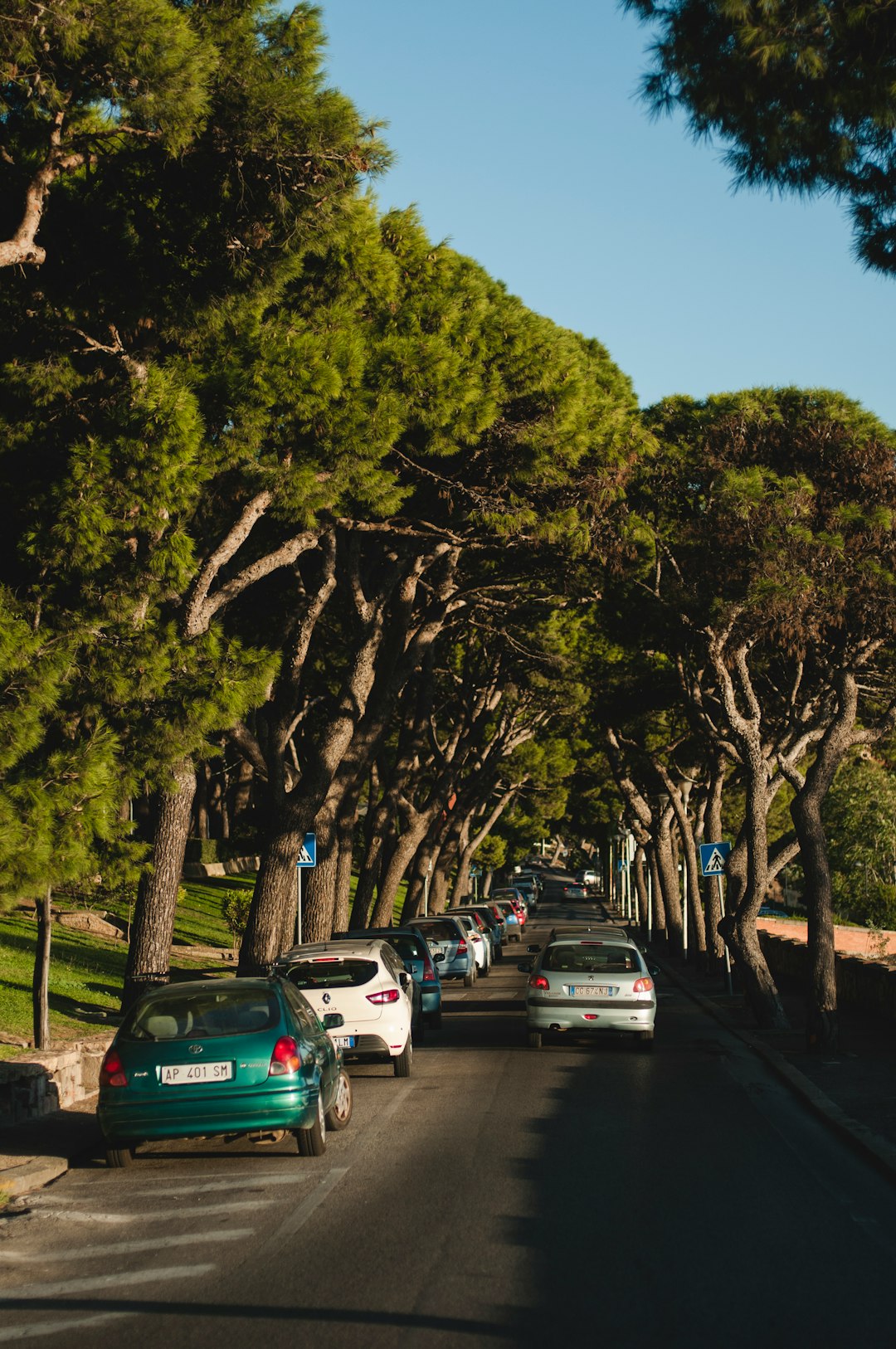 cars parked on parking lot during daytime