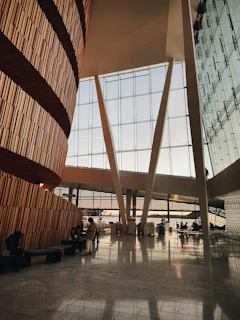 Evening shot of founders discussing plans in a modern, minimalist room with strong architectural lines.
