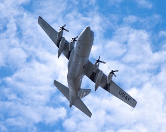 gray fighter plane flying in the sky during daytime