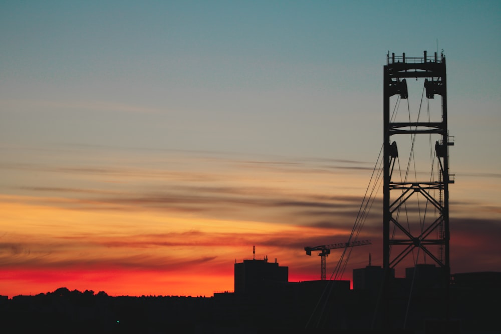 silhouette of building during sunset