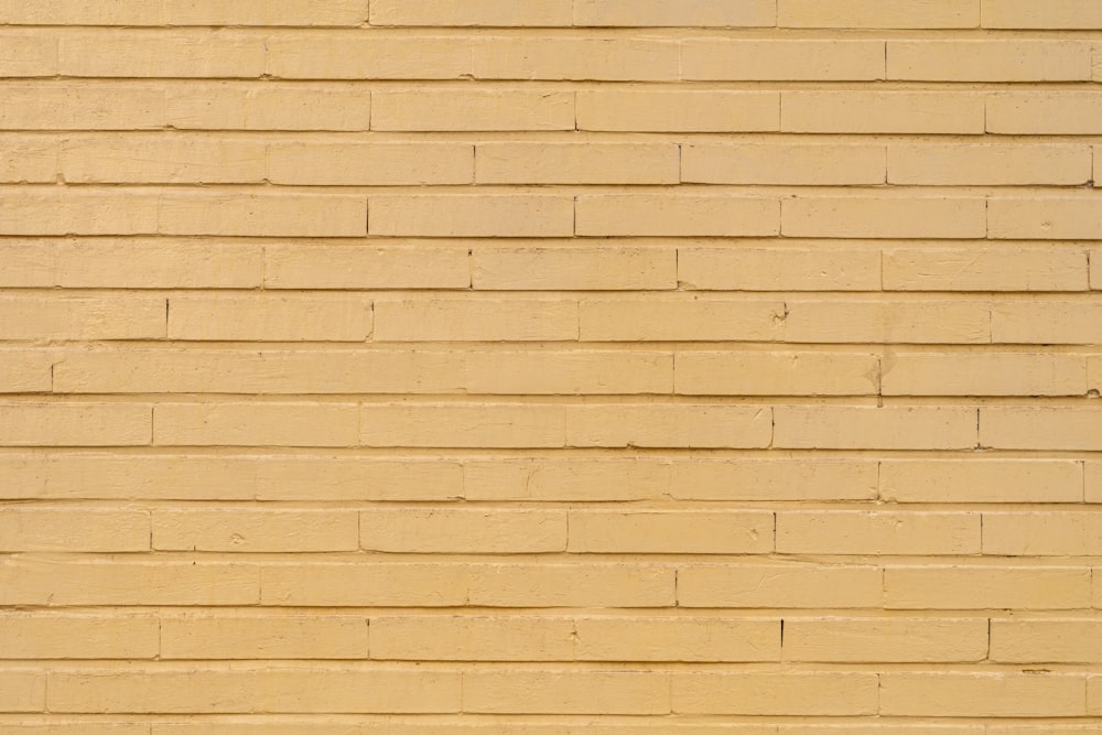 brown brick wall during daytime