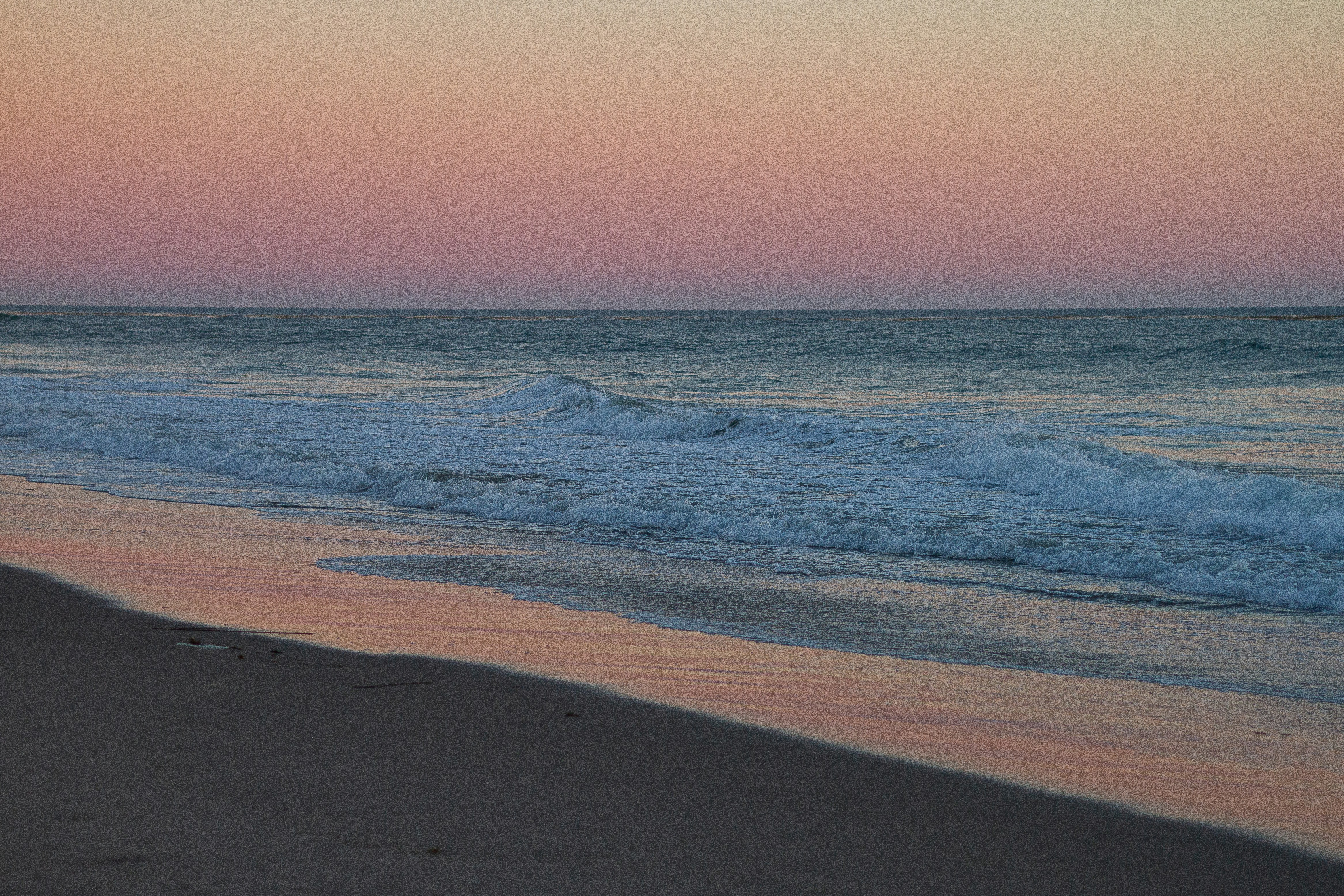 blue ocean water under blue sky during daytime