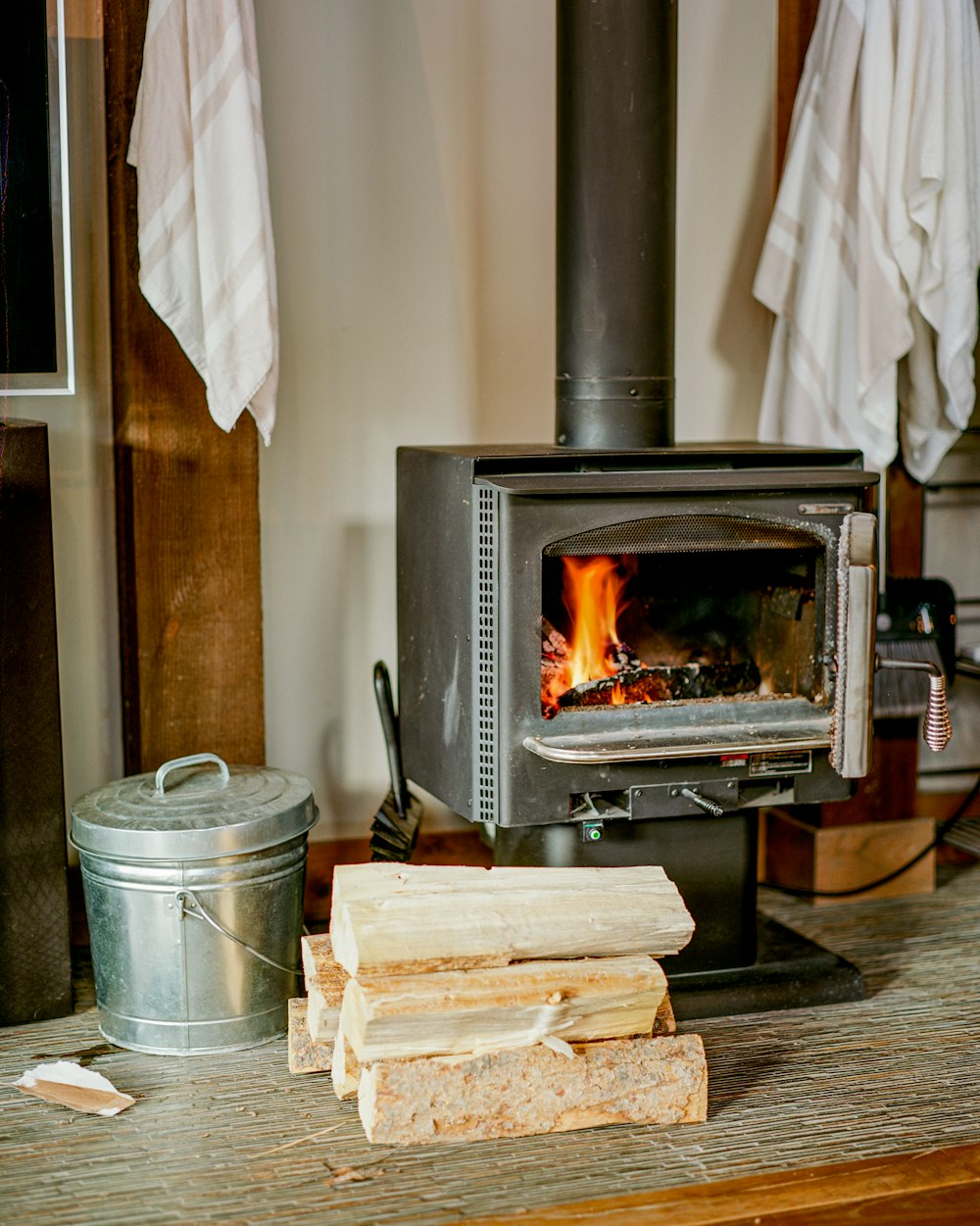 black wood burner on brown wooden table