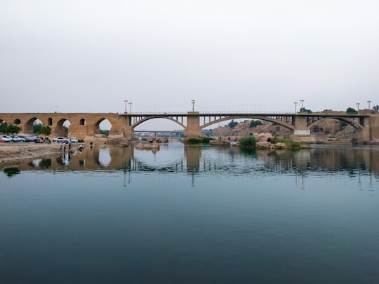 brown concrete bridge over river in Dezful Iran