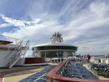 white and red ship on dock during daytime
