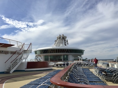 white and red ship on dock during daytime