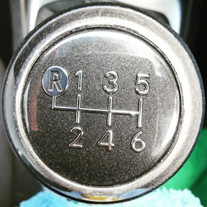 Close-up of a rugged titanium car gear with a sleek metallic finish.