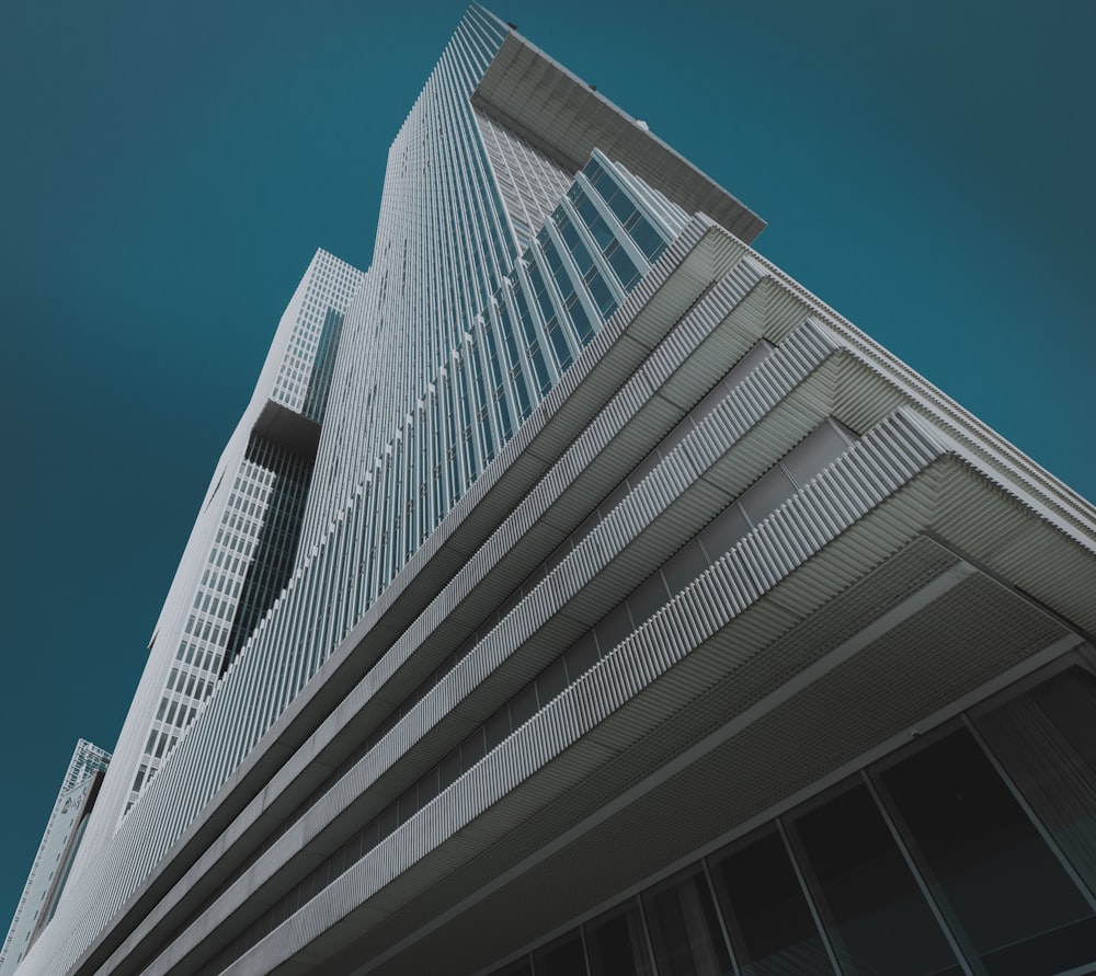 white concrete building under blue sky during daytime