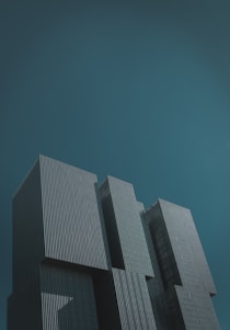 black concrete building under blue sky