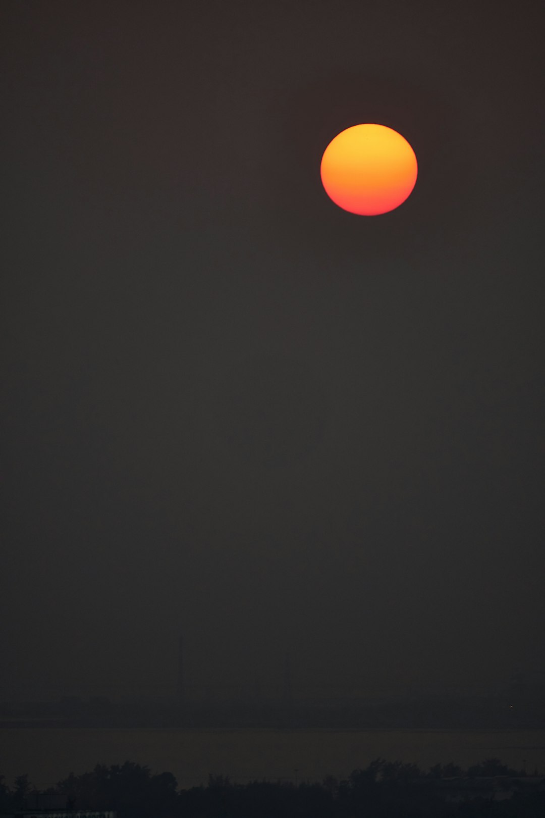 orange round light on black background