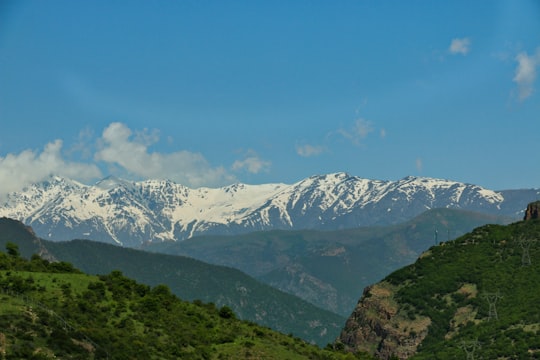 snow covered mountain under blue sky during daytime in Chalus Iran