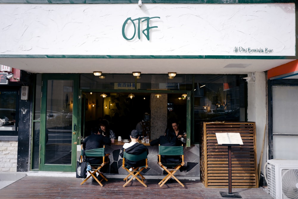 people sitting on chair in restaurant