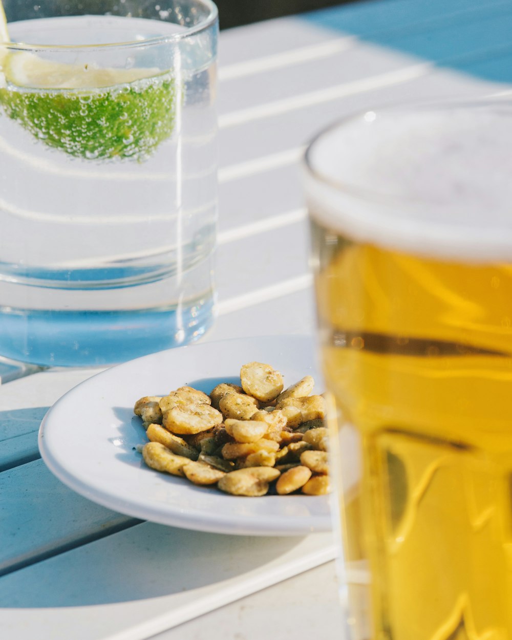 clear drinking glass with yellow liquid