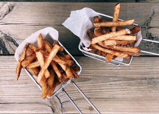 fried fries on white paper