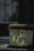 A close-up of a sleek stainless steel fire water tank gleaming under soft lighting.