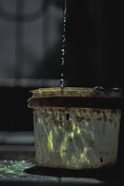 A close-up of a sleek stainless steel fire water tank gleaming under soft lighting.