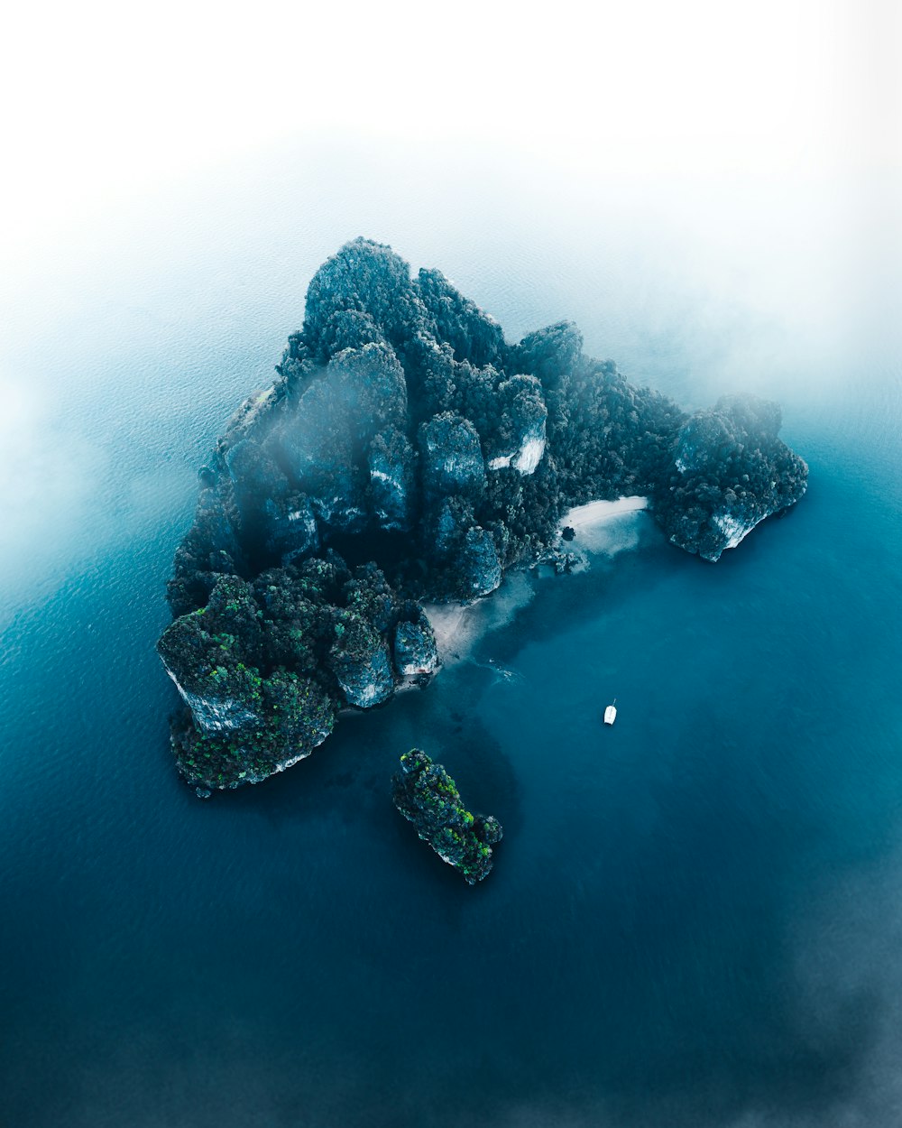 aerial view of green and black island