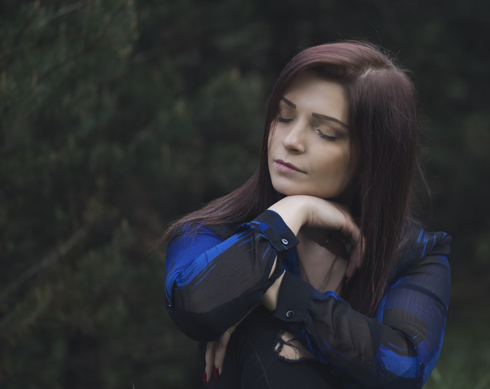 woman in blue and black jacket