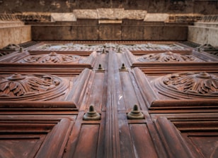 Close-up of a beautifully crafted wooden door with intricate carvings.