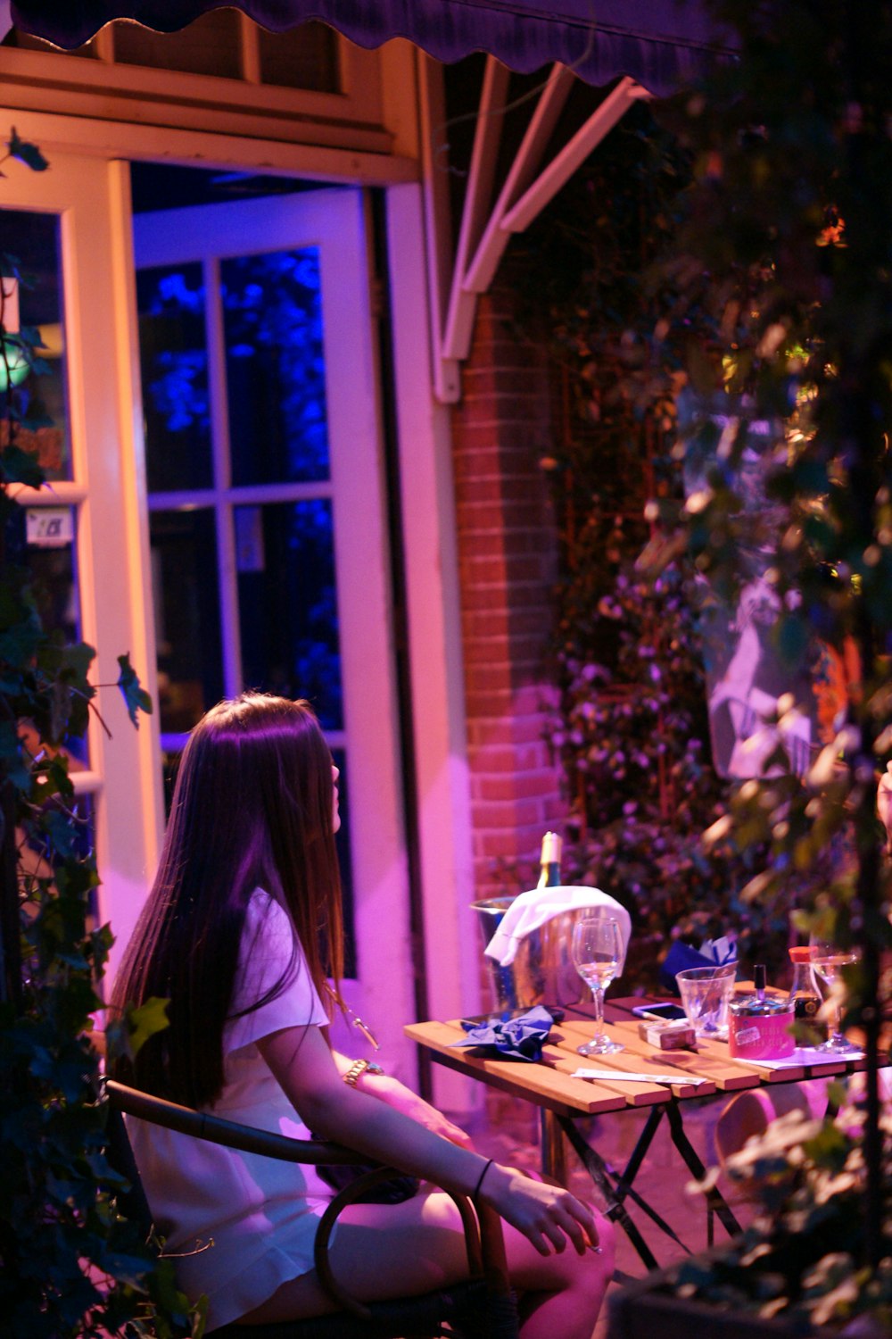 woman in black shirt sitting on chair