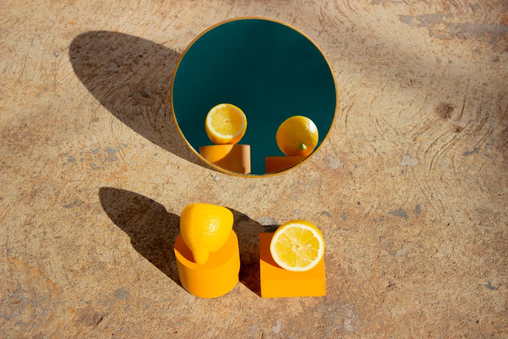 blue and yellow round plastic toy