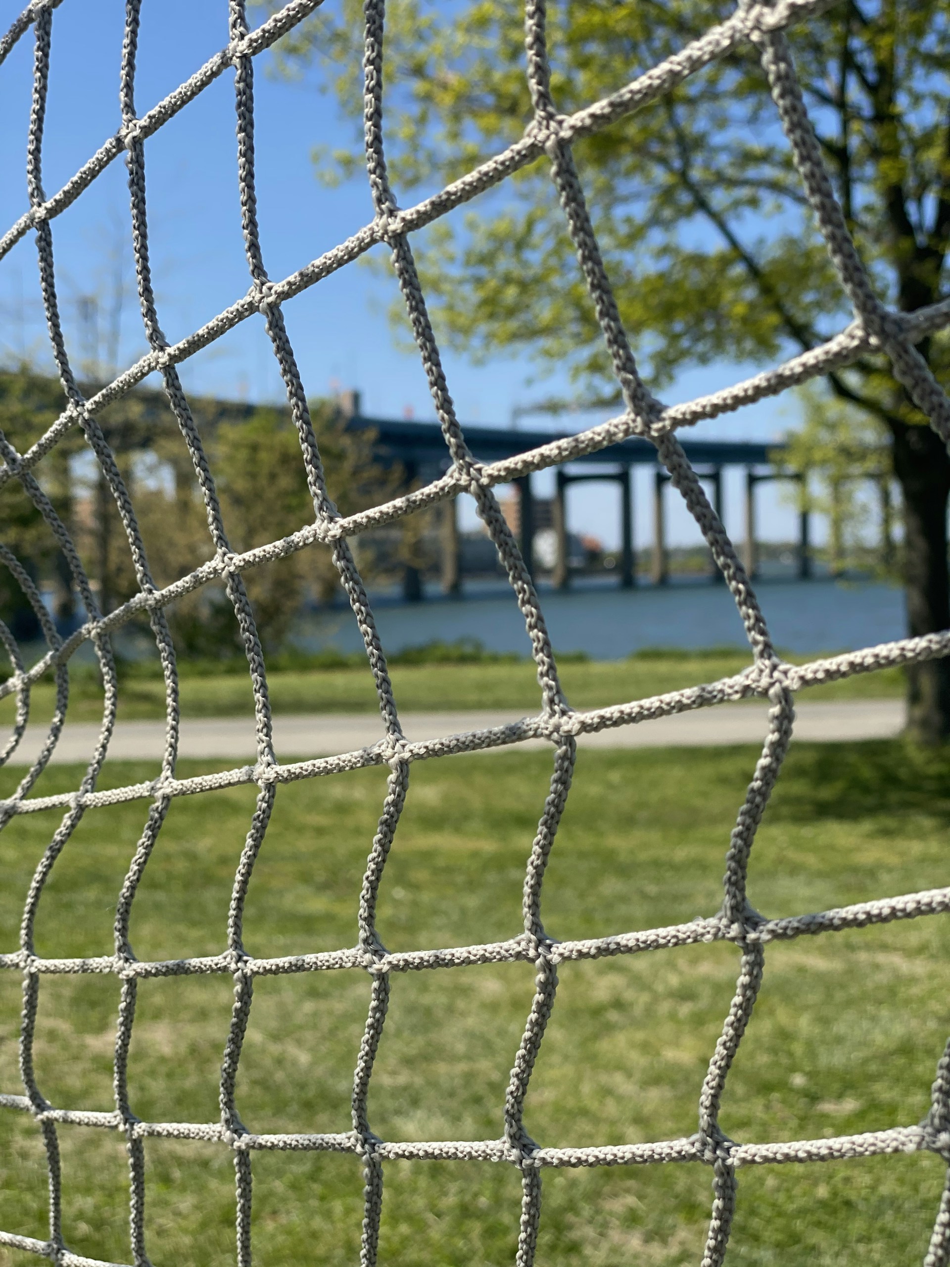 woman wearing yellow long-sleeved dress under white clouds and blue sky during daytime